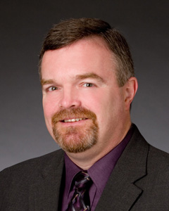 headshot of karl wilson, applications development manager